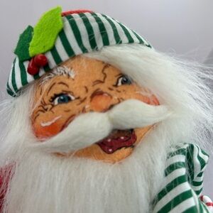 **Annalee Jolly Santa wearing reindeer slippers. 2007